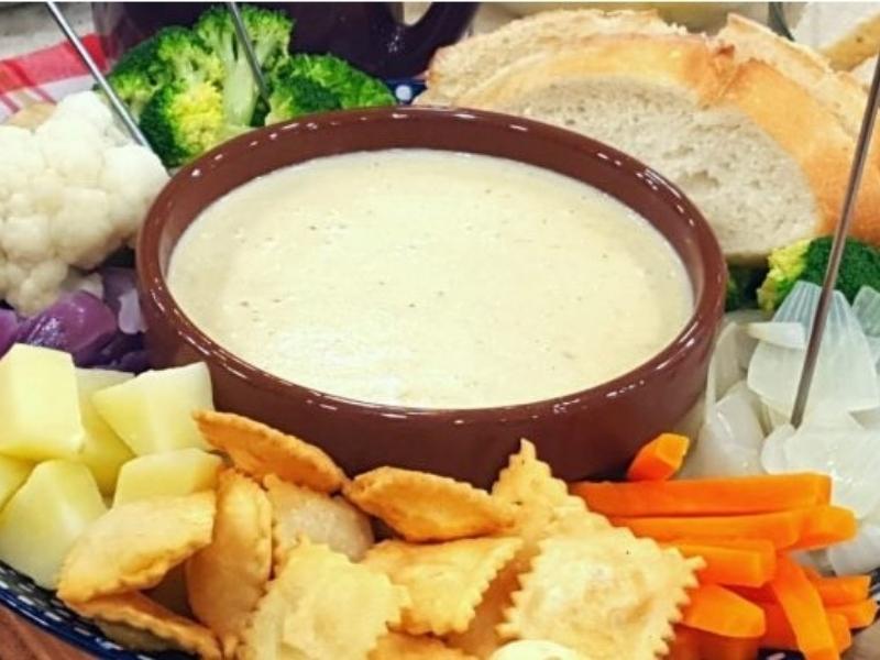 Patatas, calabaza y raviolis con Bagna cauda